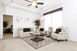 The PREFERRED PLUS CP561F Living Room. This Manufactured Mobile Home features 3 bedrooms and 2 baths.