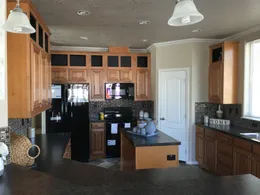 The PREFERRED PLUS CP601F Kitchen. This Manufactured Mobile Home features 3 bedrooms and 2 baths.