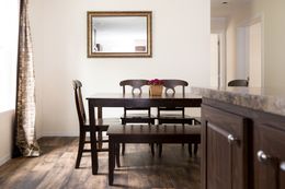 The RANGER 56B Dining Area. This Manufactured Mobile Home features 3 bedrooms and 2 baths.