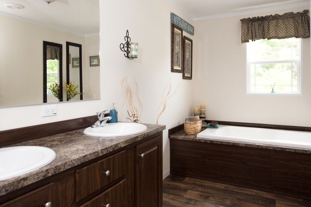 The RANGER 56B Master Bathroom. This Manufactured Mobile Home features 3 bedrooms and 2 baths.