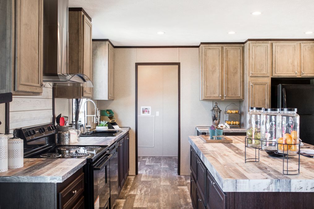The SIG28483B Kitchen. This Manufactured Mobile Home features 3 bedrooms and 2 baths.