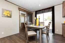 The THE ANNIVERSARY 2.0 Dining Area. This Manufactured Mobile Home features 3 bedrooms and 2 baths.