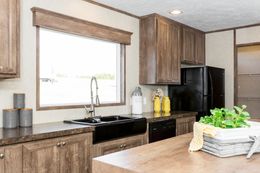 The THE ANNIVERSARY 2.0 Kitchen. This Manufactured Mobile Home features 3 bedrooms and 2 baths.