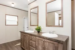 The THE ANNIVERSARY 2.0 Primary Bathroom. This Manufactured Mobile Home features 3 bedrooms and 2 baths.