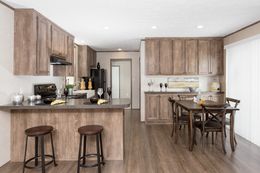 The THE ANNIVERSARY Kitchen. This Manufactured Mobile Home features 3 bedrooms and 2 baths.