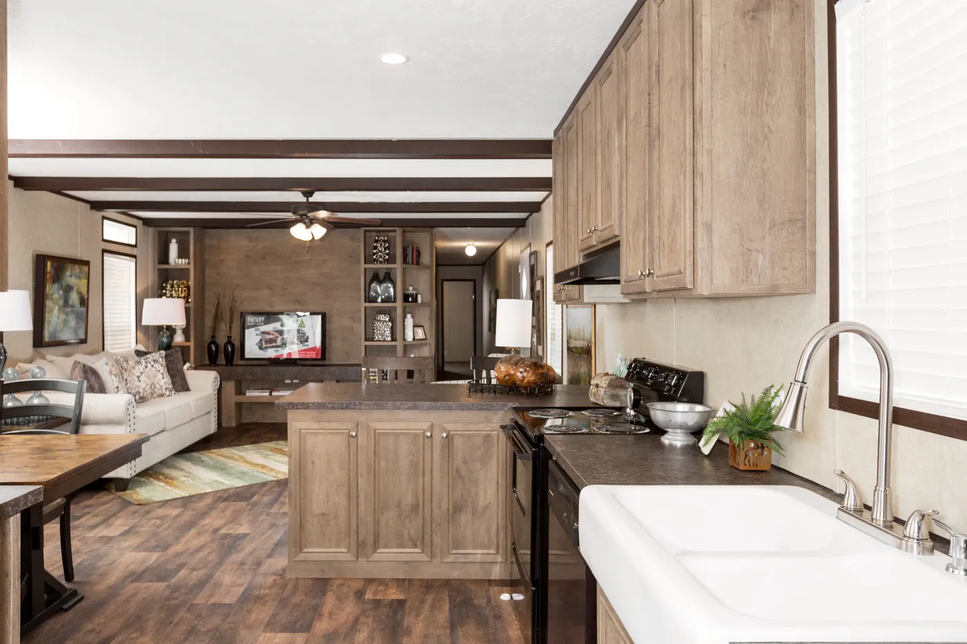 The THE ANNIVERSARY ANN16864A Kitchen. This Manufactured Mobile Home features 4 bedrooms and 2 baths.