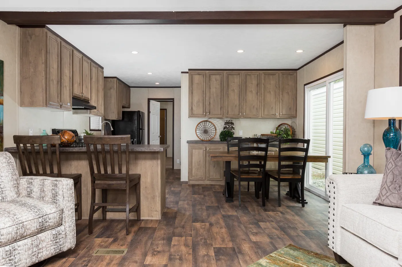 The THE ANNIVERSARY ANN16864A Kitchen. This Manufactured Mobile Home features 4 bedrooms and 2 baths.