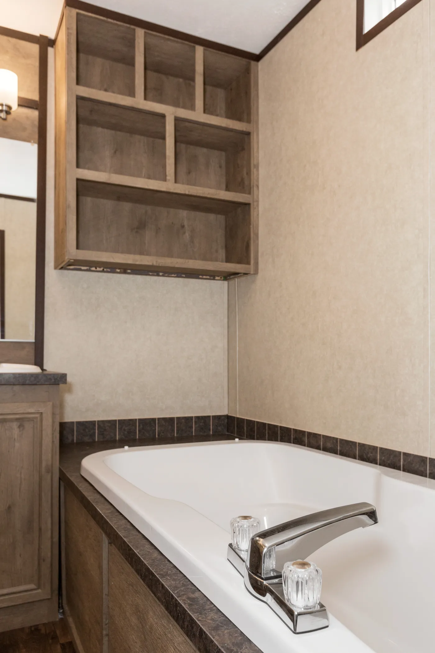 The THE ANNIVERSARY ANN16864A Primary Bathroom. This Manufactured Mobile Home features 4 bedrooms and 2 baths.