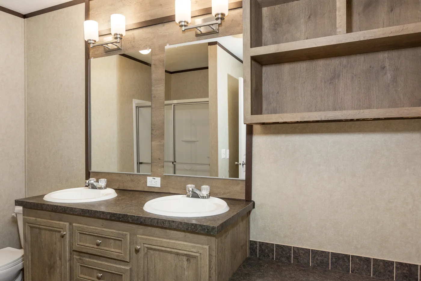 The THE ANNIVERSARY ANN16864A Primary Bathroom. This Manufactured Mobile Home features 4 bedrooms and 2 baths.