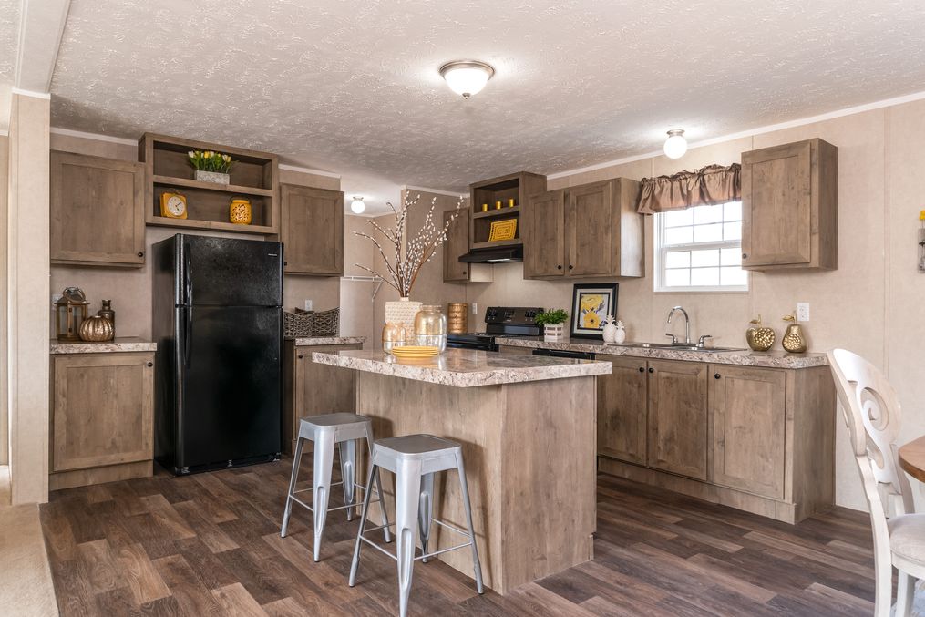 The THE EAGLE 52 Kitchen. This Manufactured Mobile Home features 3 bedrooms and 2 baths.