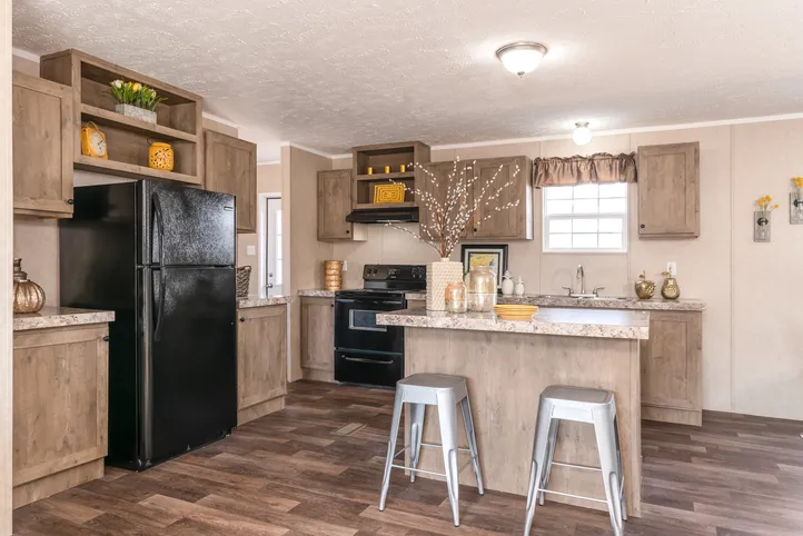 The THE EAGLE 52 Kitchen. This Manufactured Mobile Home features 3 bedrooms and 2 baths.