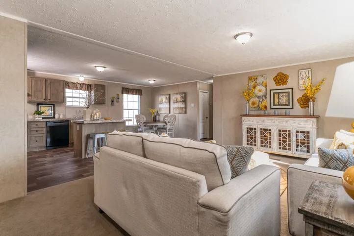 The THE EAGLE 52 Living Room. This Manufactured Mobile Home features 3 bedrooms and 2 baths.