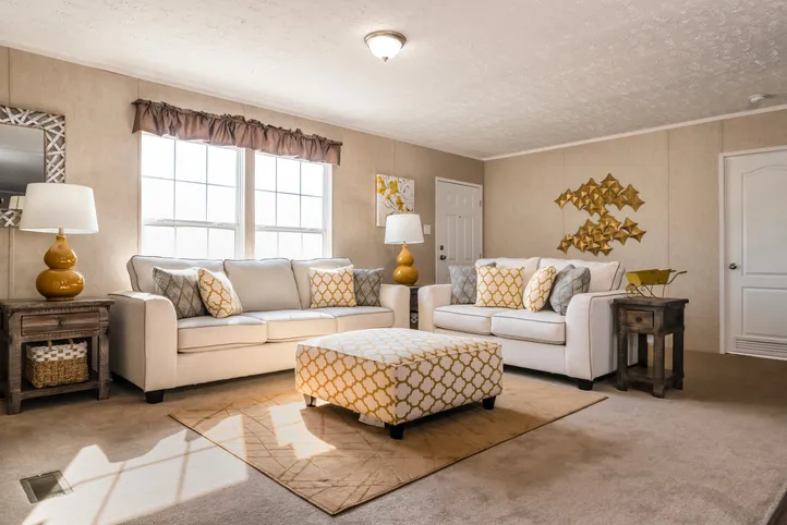 The THE EAGLE 52 Living Room. This Manufactured Mobile Home features 3 bedrooms and 2 baths.