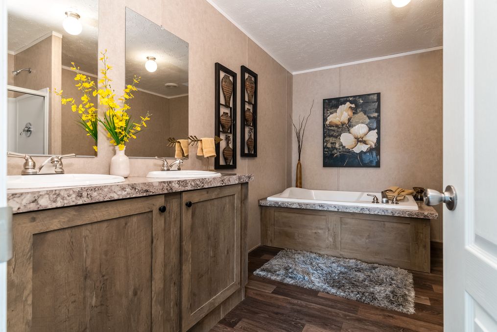 The THE EAGLE 52 Master Bathroom. This Manufactured Mobile Home features 3 bedrooms and 2 baths.