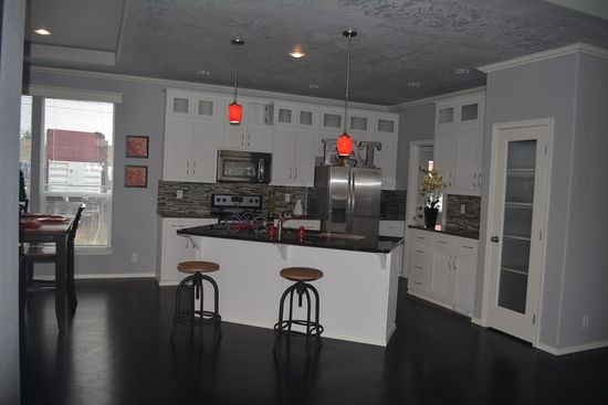 The THE EUCALYPTUS Kitchen. This Manufactured Mobile Home features 3 bedrooms and 2 baths.