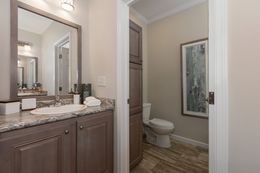 The THE KENNESAW Guest Bathroom. This Manufactured Mobile Home features 4 bedrooms and 2 baths.