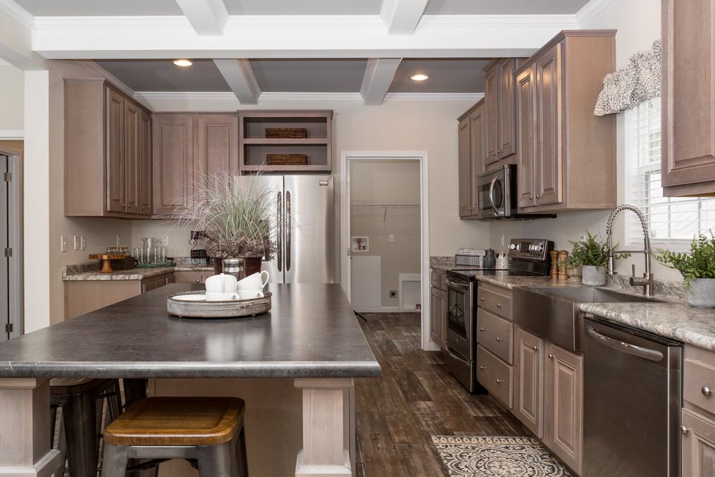 The THE KENNESAW Kitchen. This Manufactured Mobile Home features 4 bedrooms and 2 baths.