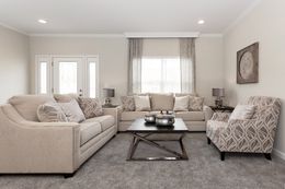 The THE KENNESAW Living Room. This Manufactured Mobile Home features 4 bedrooms and 2 baths.
