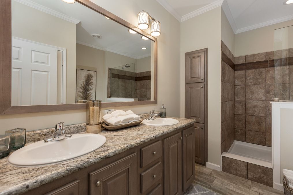 The THE KENNESAW Primary Bathroom. This Manufactured Mobile Home features 4 bedrooms and 2 baths.