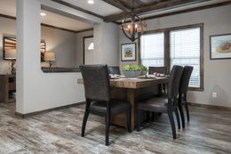The THE LITTLEFIELD Dining Area. This Manufactured Mobile Home features 3 bedrooms and 2 baths.
