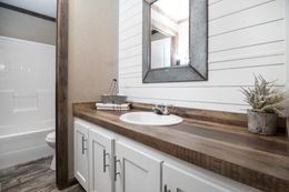 The THE LITTLEFIELD Guest Bathroom. This Manufactured Mobile Home features 3 bedrooms and 2 baths.