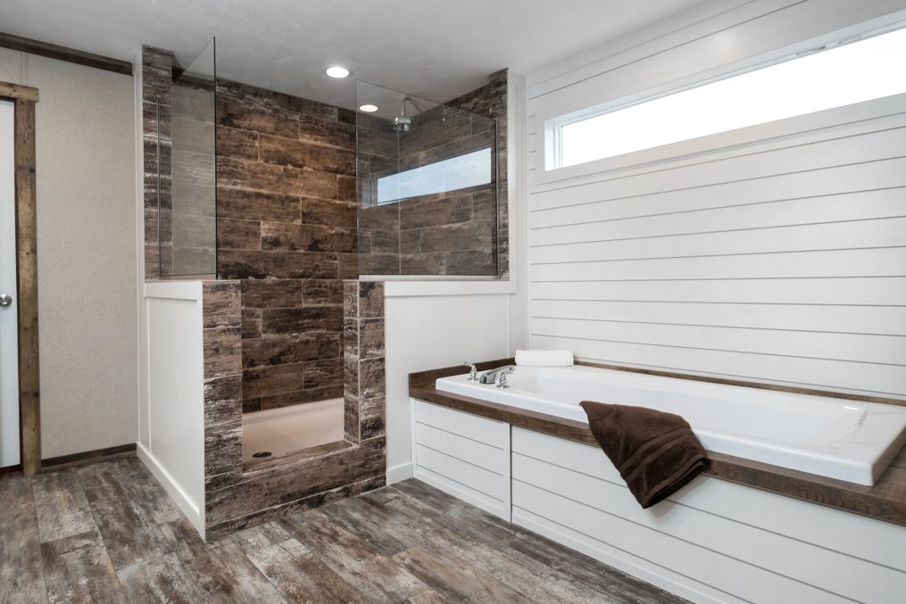 The THE LITTLEFIELD Master Bathroom. This Manufactured Mobile Home features 3 bedrooms and 2 baths.
