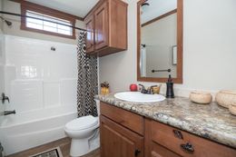 The THE OHIO Guest Bathroom. This Manufactured Mobile Home features 4 bedrooms and 2 baths.
