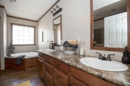 The THE OHIO Master Bathroom. This Manufactured Mobile Home features 4 bedrooms and 2 baths.