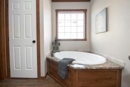 The THE OHIO Master Bathroom. This Manufactured Mobile Home features 4 bedrooms and 2 baths.
