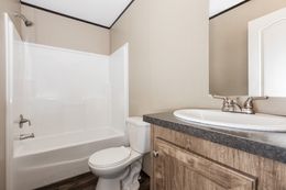 The THE SOLUTION Guest Bathroom. This Manufactured Mobile Home features 3 bedrooms and 2 baths.