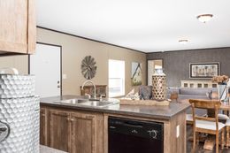 The THE SOLUTION Kitchen. This Manufactured Mobile Home features 3 bedrooms and 2 baths.