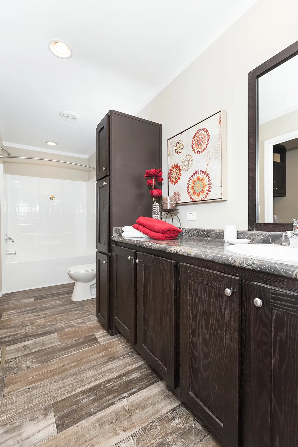 The VERSAILLES Guest Bathroom. This Manufactured Mobile Home features 3 bedrooms and 2 baths.