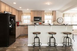 The VERSAILLES Kitchen. This Manufactured Mobile Home features 3 bedrooms and 2 baths.