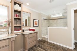 The VERSAILLES Primary Bathroom. This Manufactured Mobile Home features 3 bedrooms and 2 baths.