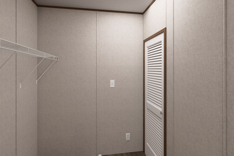 The CYPRESS Exterior. This Manufactured Mobile Home features 4 bedrooms and 2 baths.