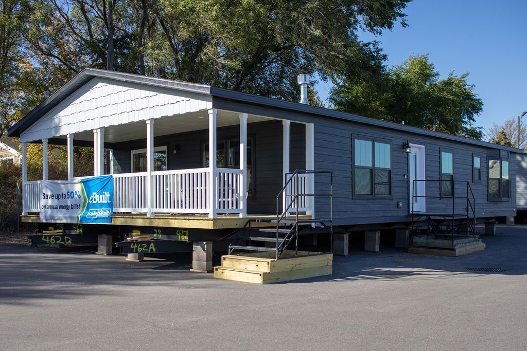 The LEGEND 76-4 Exterior. This Manufactured Mobile Home features 3 bedrooms and 2 baths.