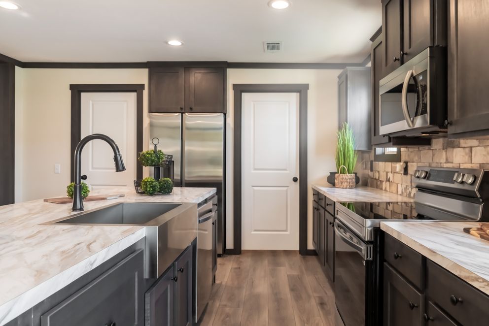 The THE VOGUE 60 Exterior. This Manufactured Mobile Home features 3 bedrooms and 2 baths.