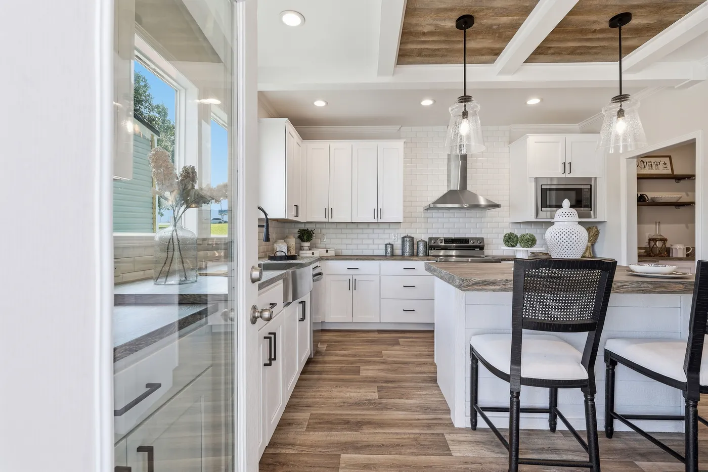 The SOUTHERN CHARM Exterior. This Manufactured Mobile Home features 3 bedrooms and 2 baths.