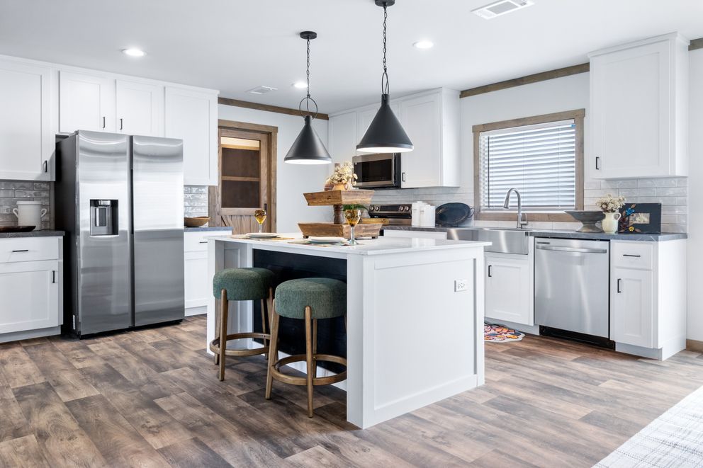The FARM 3 FLEX ELITE DEN Exterior. This Manufactured Mobile Home features 3 bedrooms and 2 baths.
