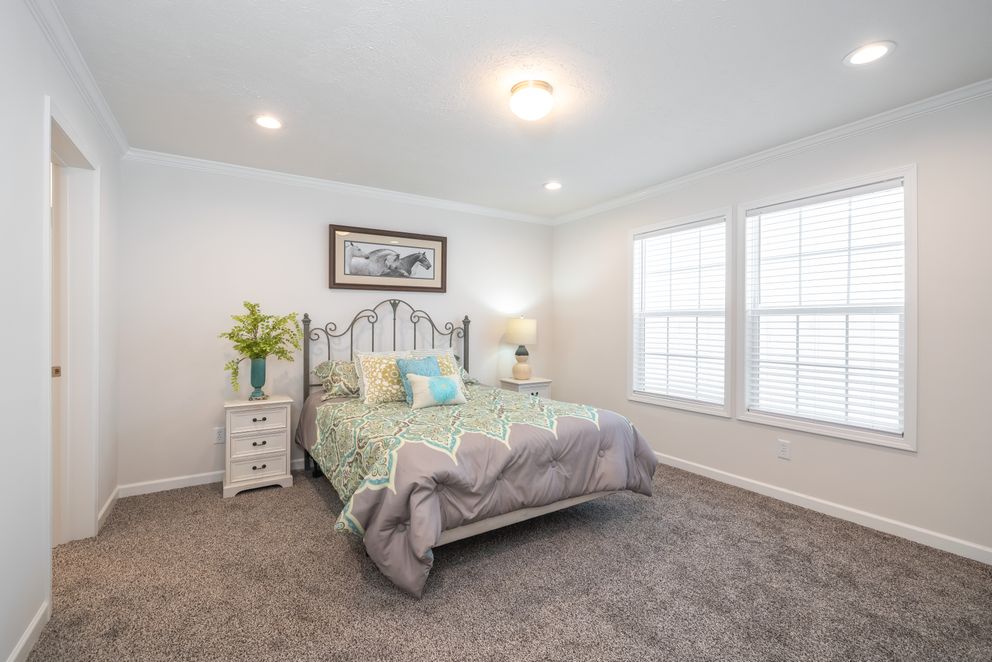 The PINEHURST 3104 Exterior. This Manufactured Mobile Home features 3 bedrooms and 2 baths.