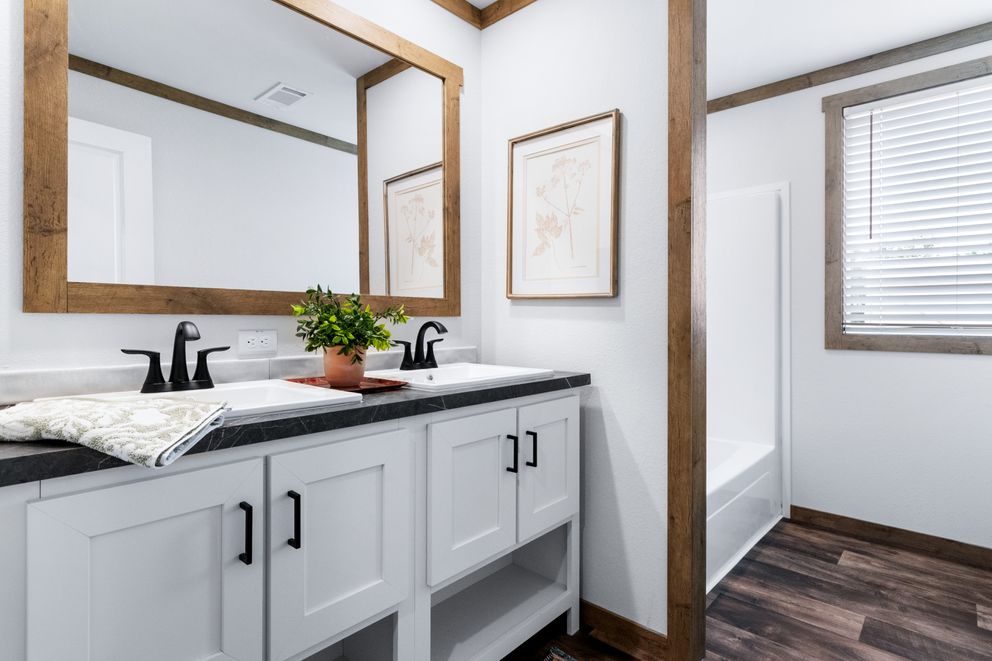 The FARM 3 FLEX ELITE DEN Exterior. This Manufactured Mobile Home features 3 bedrooms and 2 baths.