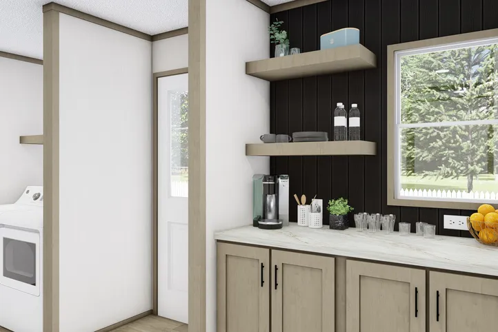 The COOK Exterior. This Manufactured Mobile Home features 3 bedrooms and 2 baths.