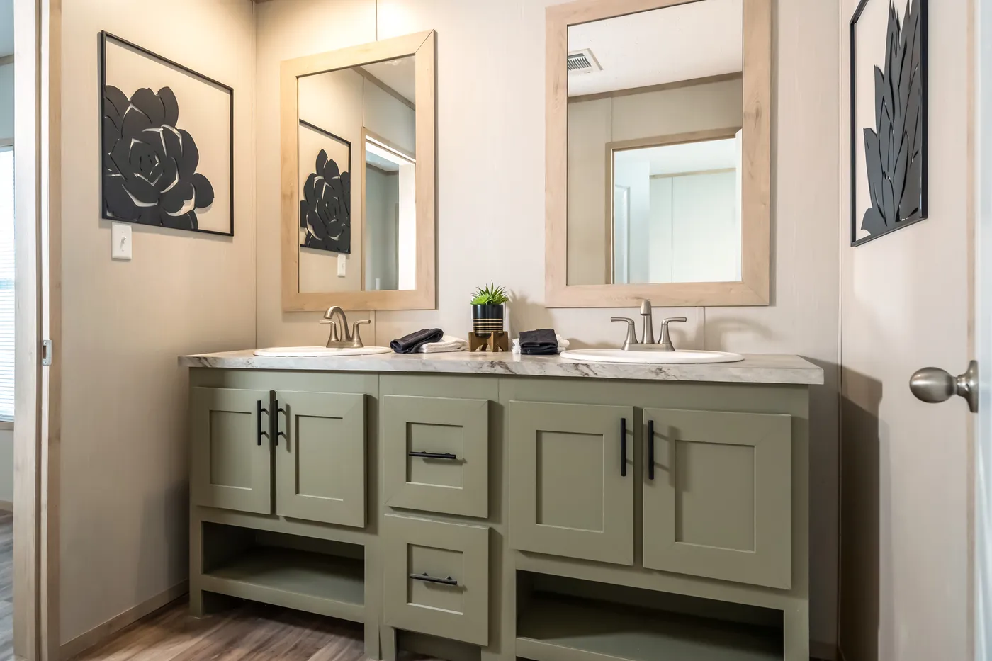 The RAINIER Exterior. This Manufactured Mobile Home features 4 bedrooms and 3 baths.