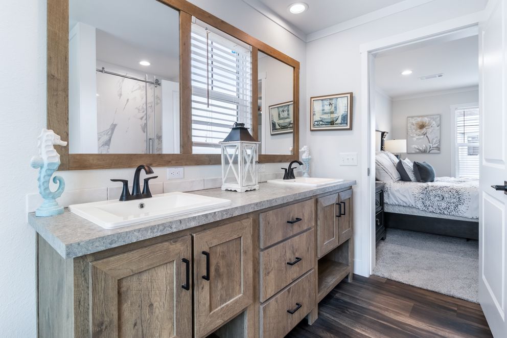 The LIZZIE Exterior. This Manufactured Mobile Home features 3 bedrooms and 2 baths.