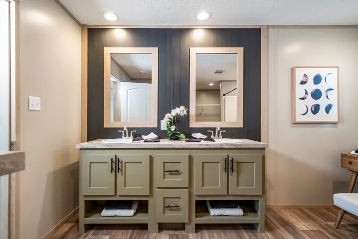 The RAINIER Exterior. This Manufactured Mobile Home features 4 bedrooms and 3 baths.