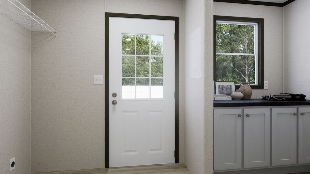 The PURPOSE Exterior. This Manufactured Mobile Home features 4 bedrooms and 2 baths.