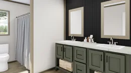 The COOK Exterior. This Manufactured Mobile Home features 3 bedrooms and 2 baths.