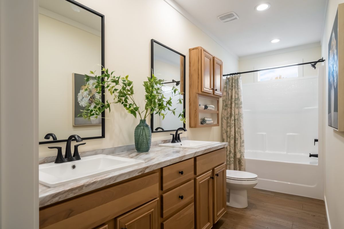 The THE ROCKING CHAIR Exterior. This Manufactured Mobile Home features 3 bedrooms and 2 baths.