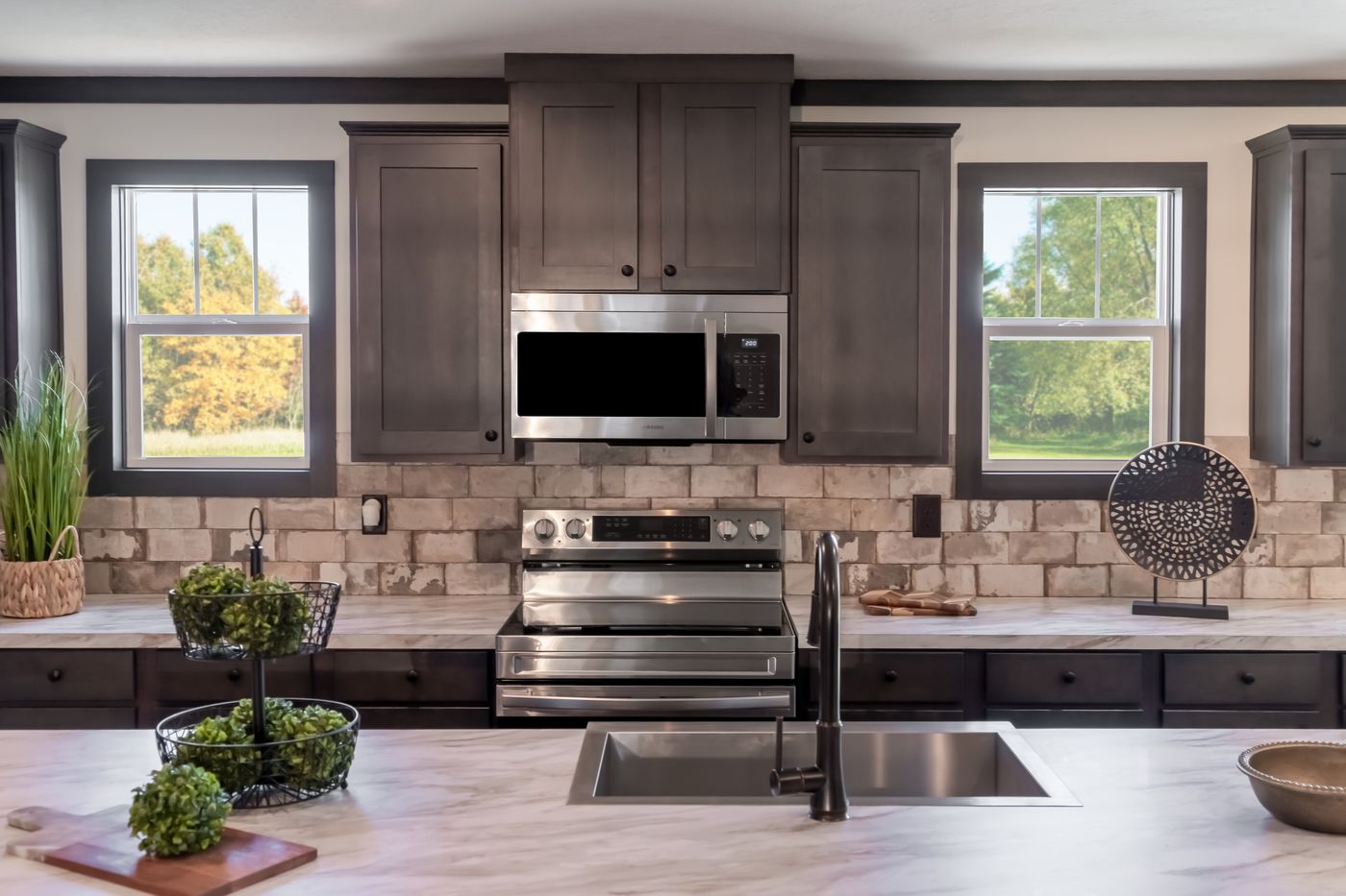The THE VOGUE 60 Exterior. This Manufactured Mobile Home features 3 bedrooms and 2 baths.