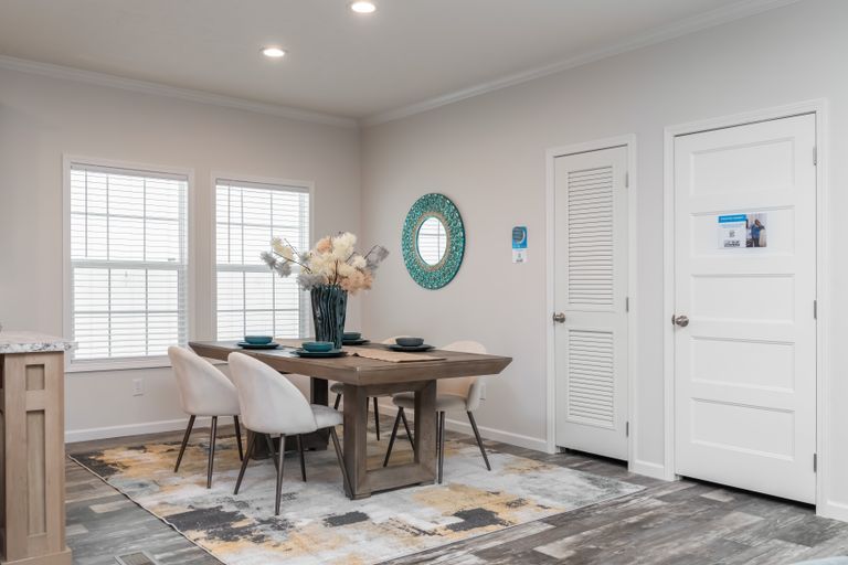 The 1717 BELLA VISTA HUD Exterior. This Manufactured Mobile Home features 4 bedrooms and 2 baths.